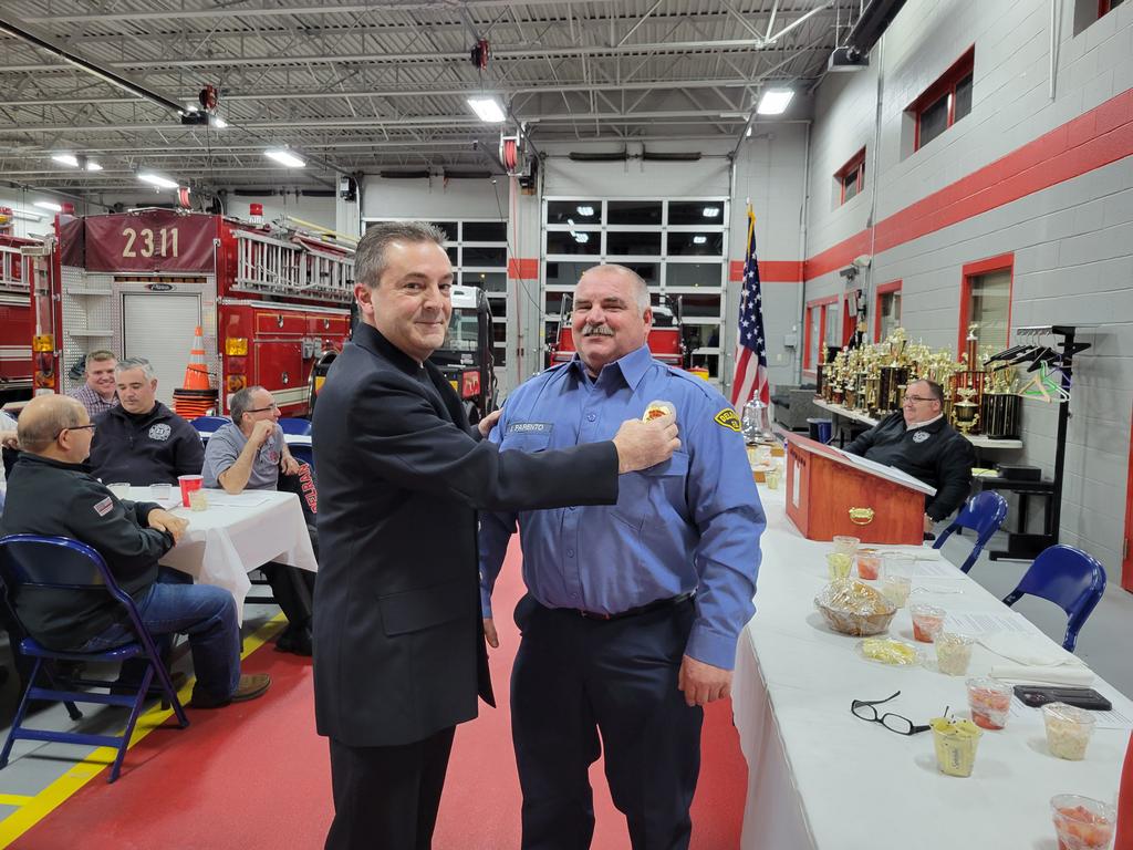 His badge pinned on by BOFC Vice President Tony Quaciari
